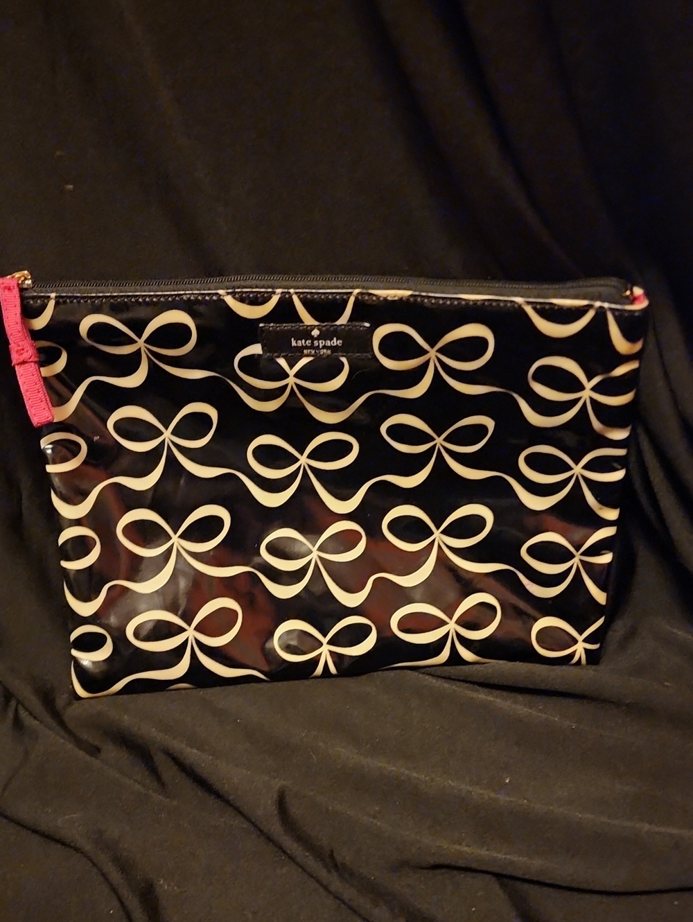 kate spade Black Cosmetic Pouch with Cream Bow Print and Pink Zip Pull